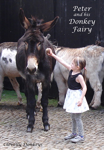 Peter being brushed by a smartly dressed little girl 